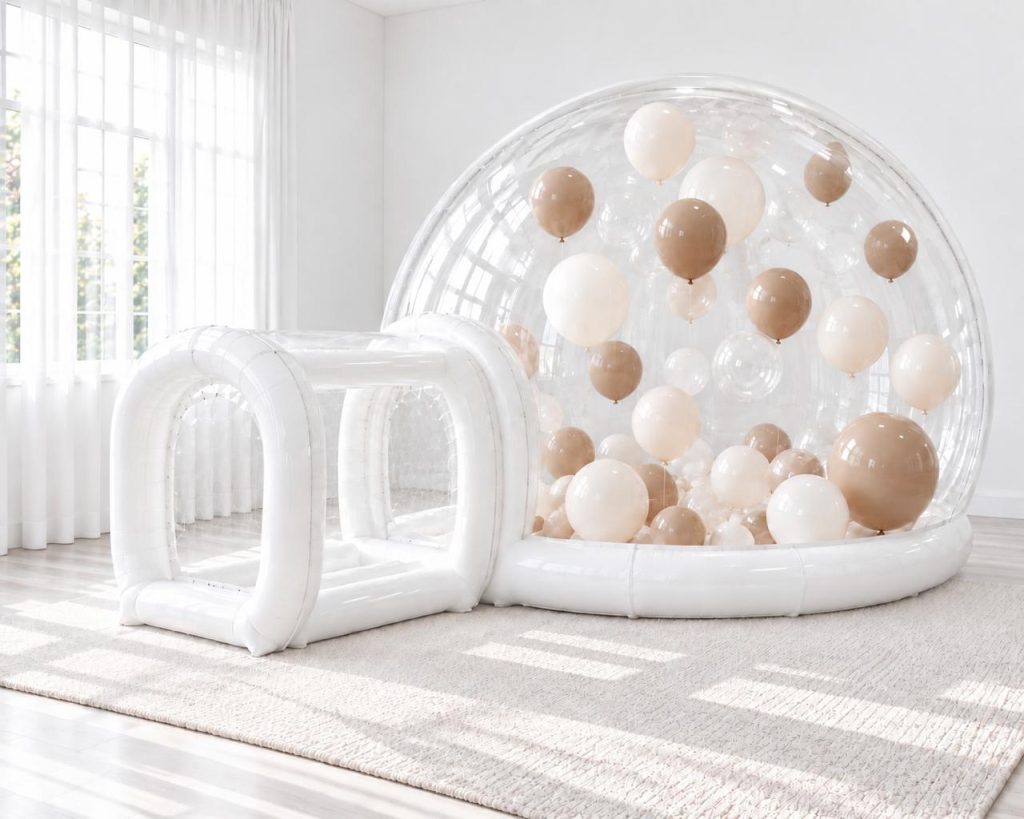 White bubble bounce filled with cream and mocha balloons